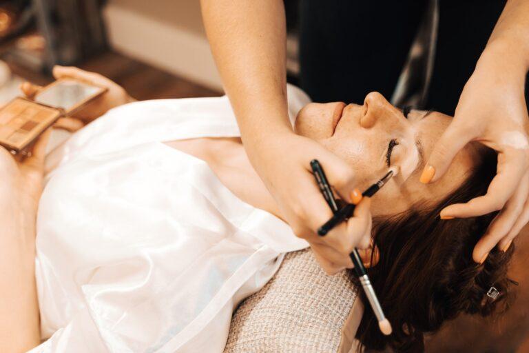 bride having makeup done
